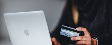 woman holding a credit card