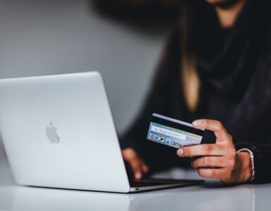 woman holding a credit card