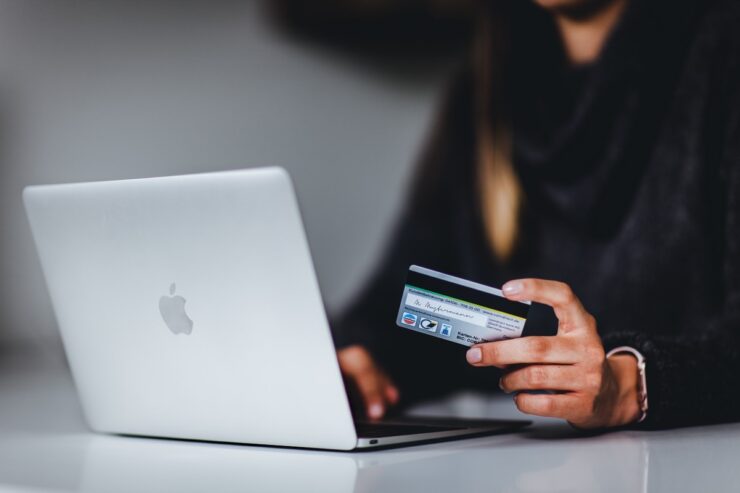 woman holding a credit card