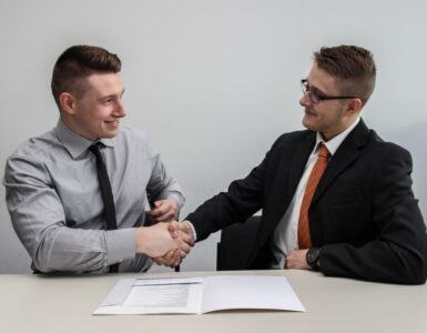 two men shaking hands